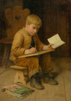 A young boy learning